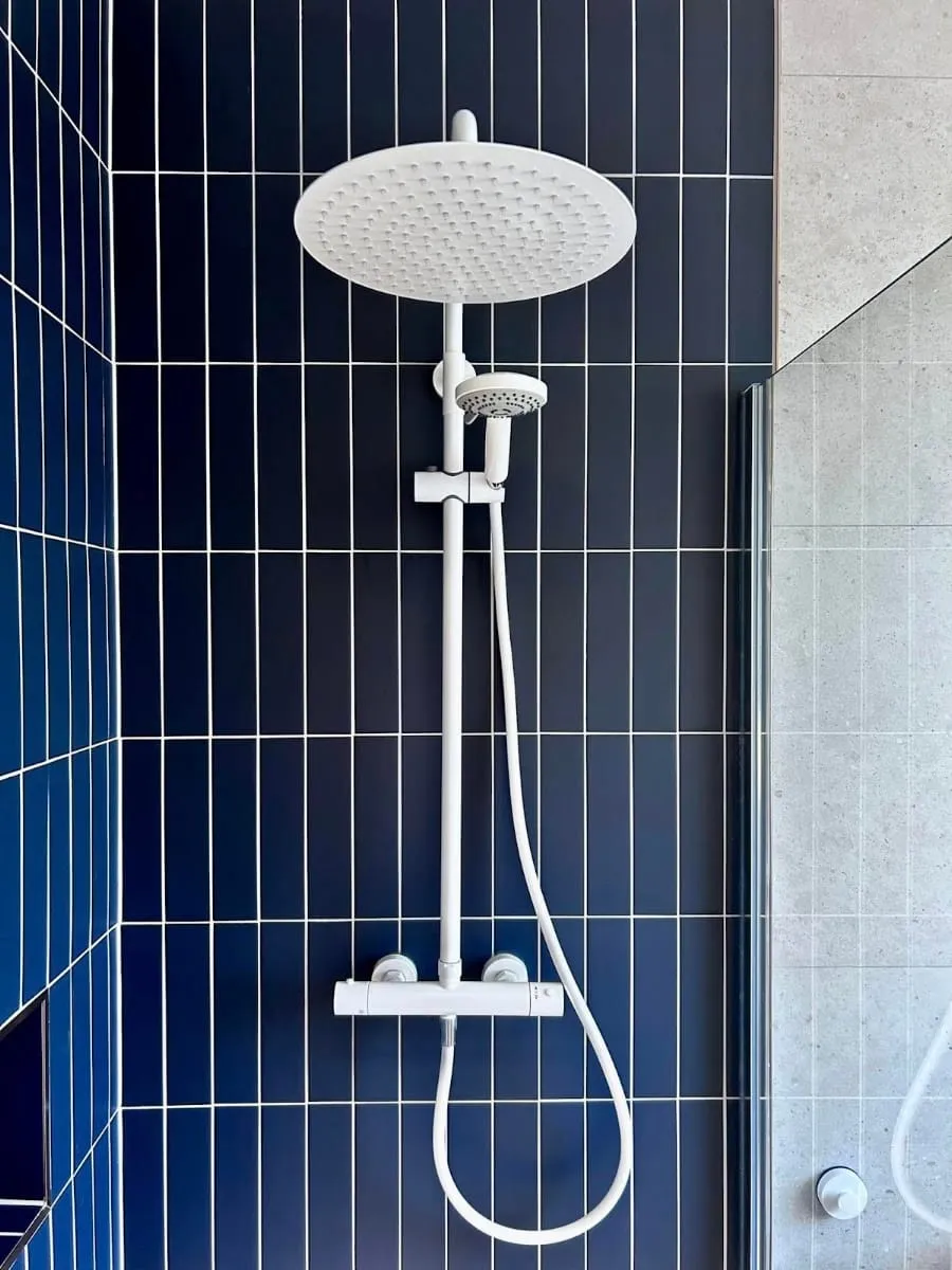 Navy tiled shower, by Plumber4life