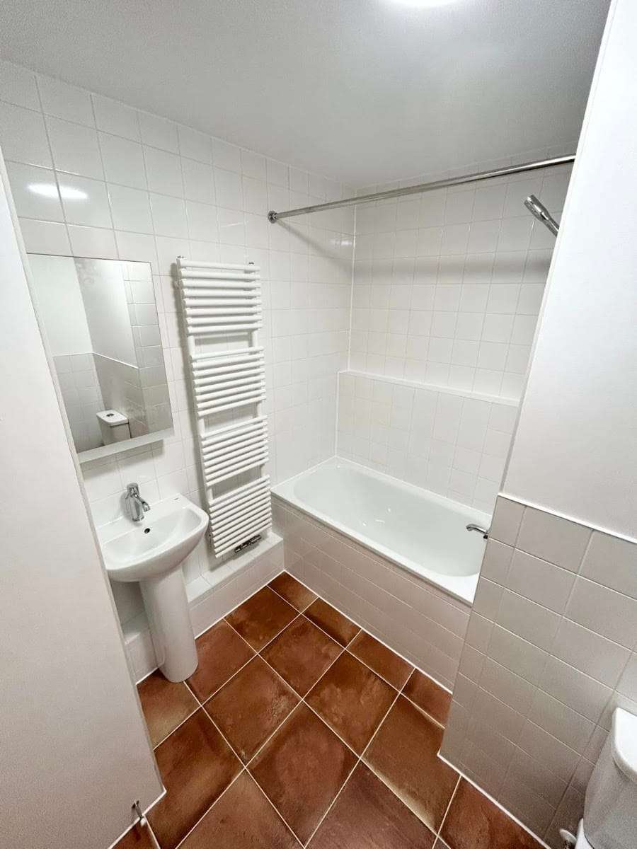 White bathroom with towel rail, by Plumber4life